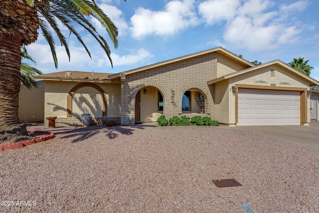 811 S 79th Way, Mesa, AZ 85208 - view of front of home featuring stucco siding, a garage, and concrete driveway