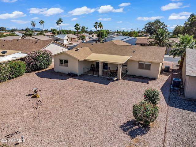 811 S 79th Way, Mesa, AZ 85208 - back of property with stucco siding, central AC unit, a residential view, and a gate