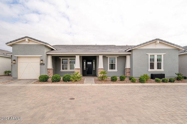 view of front of home featuring a garage