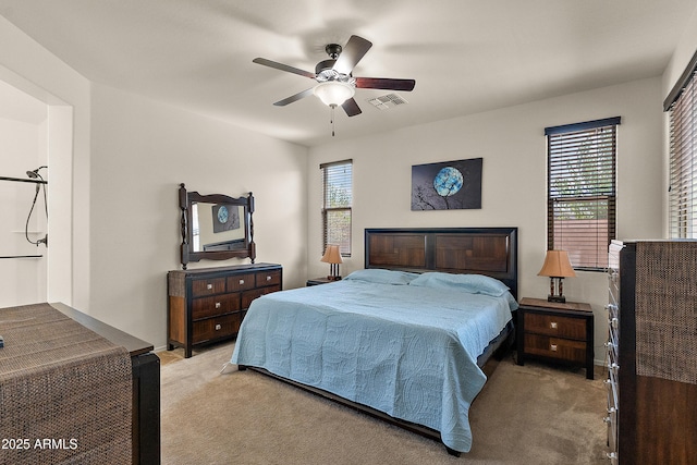 3326 N 31st St, Mesa, AZ 85213 - bedroom with light colored carpet and a ceiling fan