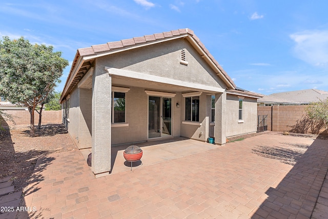 3326 N 31st St, Mesa, AZ 85213 - back of property featuring a fenced backyard, stucco siding, and a patio area