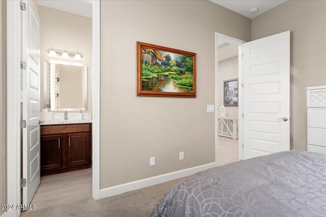 bathroom with vanity, a shower with shower door, tile patterned flooring, and tasteful backsplash