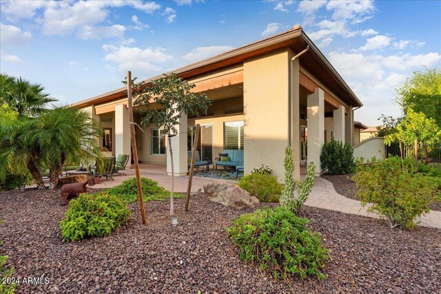 view of patio with area for grilling and exterior kitchen