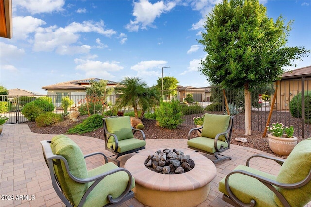 view of patio / terrace with an outdoor fire pit