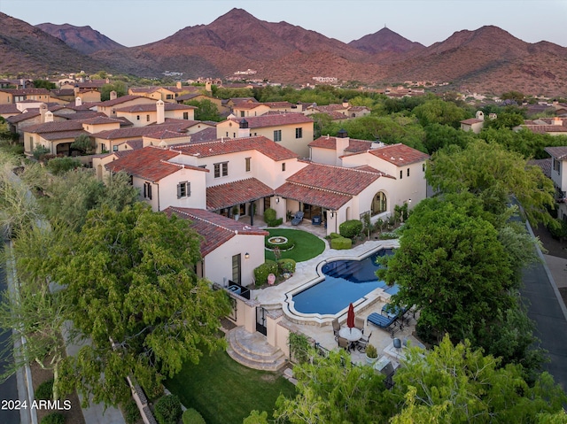 drone / aerial view featuring a mountain view