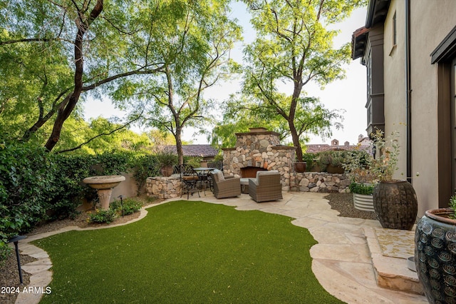 view of yard with an outdoor hangout area and a patio area