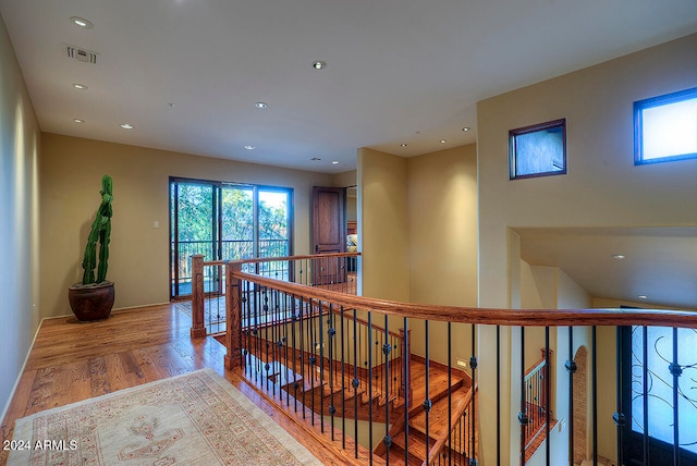 corridor featuring light hardwood / wood-style floors