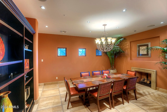 dining room featuring a notable chandelier