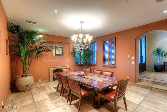 dining area with a chandelier