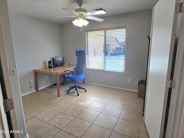 home office with light tile patterned flooring and ceiling fan