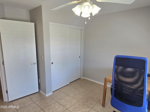 tiled office with ceiling fan