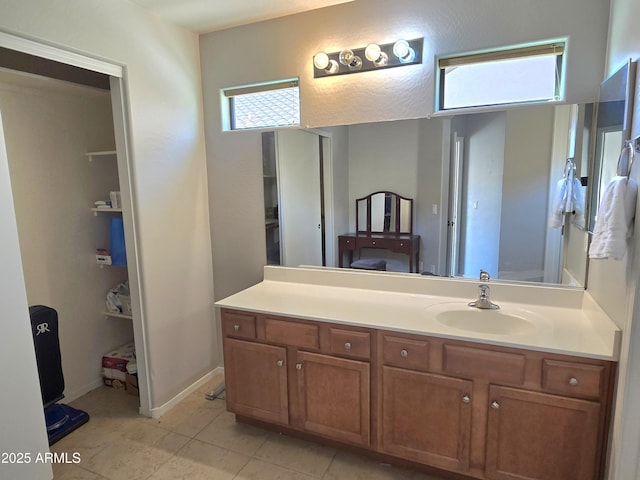 bathroom featuring vanity and tile patterned flooring