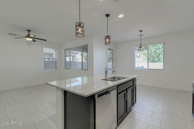 2254 E University Dr Unit 4, Mesa, AZ 85213 - kitchen with stainless steel dishwasher, decorative light fixtures, light stone countertops, a center island with sink, and ceiling fan