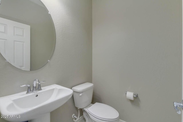 2254 E University Dr Unit 4, Mesa, AZ 85213 - half bath featuring a sink and toilet