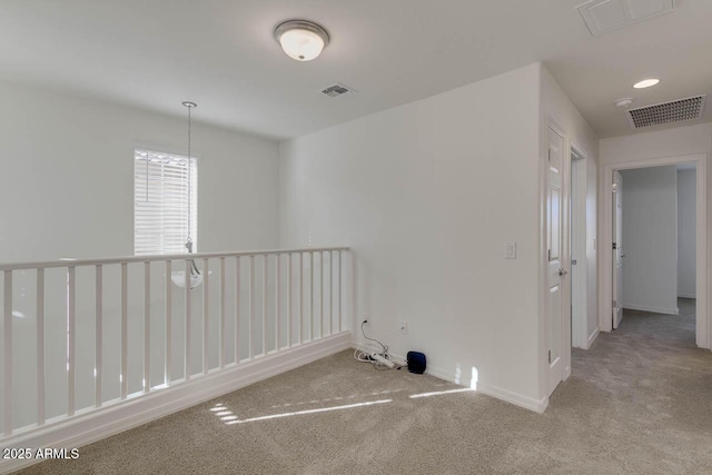 2254 E University Dr Unit 4, Mesa, AZ 85213 - carpeted spare room with baseboards