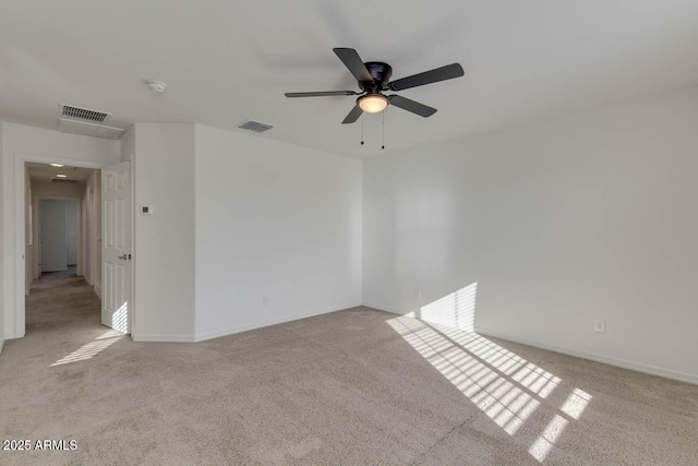 2254 E University Dr Unit 4, Mesa, AZ 85213 - carpeted empty room with a ceiling fan and baseboards