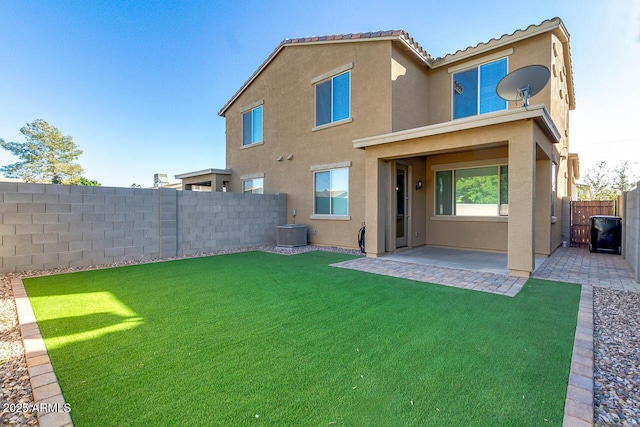 2254 E University Dr Unit 4, Mesa, AZ 85213 - rear view of property featuring stucco siding, a fenced backyard, and a patio