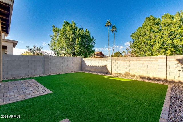 2254 E University Dr Unit 4, Mesa, AZ 85213 - fenced backyard featuring a patio