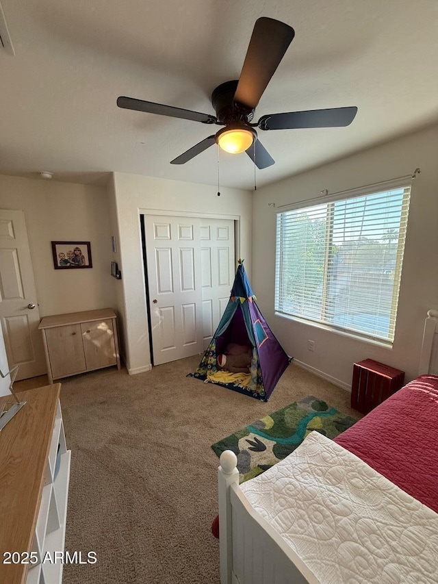 2254 E University Dr Unit 4, Mesa, AZ 85213 - carpeted bedroom featuring a closet and a ceiling fan