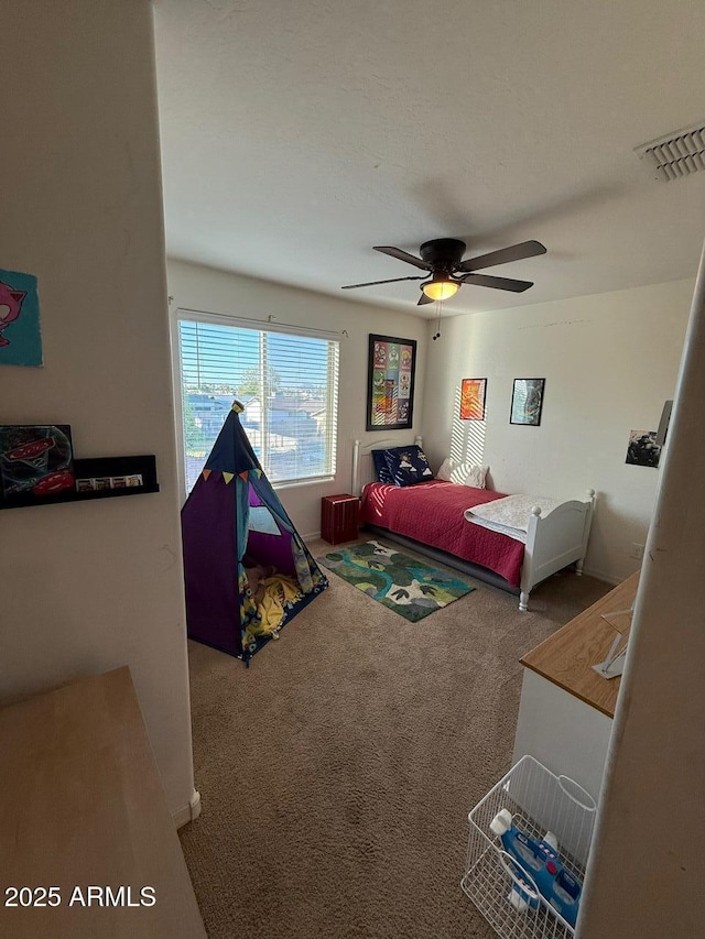 2254 E University Dr Unit 4, Mesa, AZ 85213 - carpeted bedroom featuring a ceiling fan