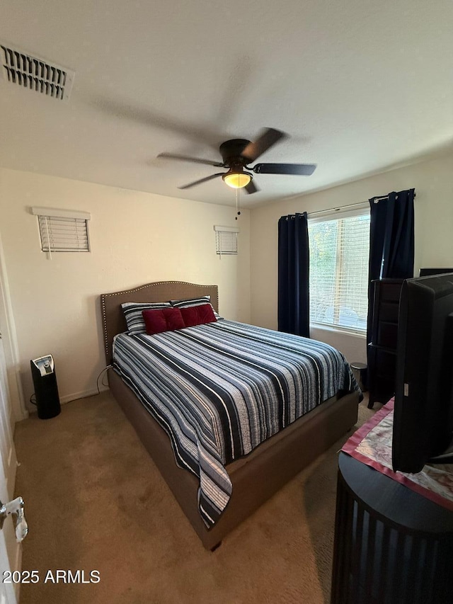 2254 E University Dr Unit 4, Mesa, AZ 85213 - carpeted bedroom with a ceiling fan and baseboards