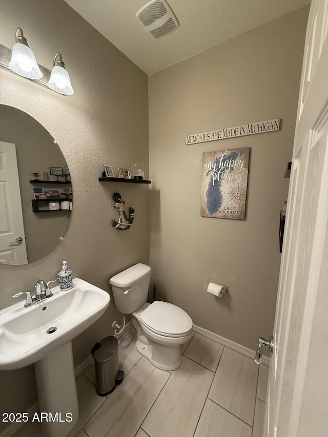 2254 E University Dr Unit 4, Mesa, AZ 85213 - bathroom with toilet and baseboards