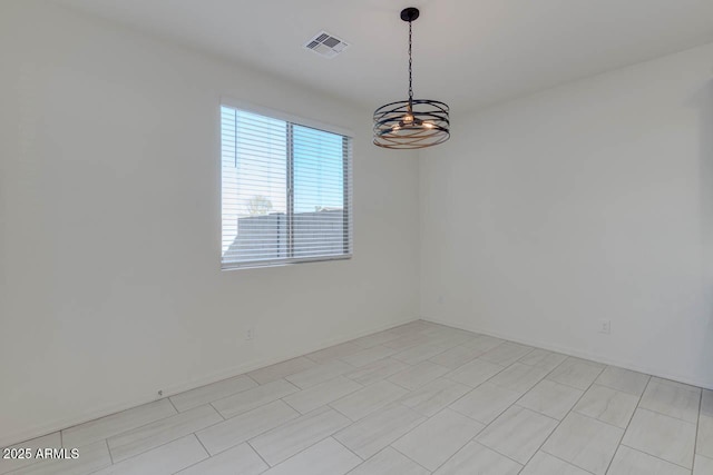 2254 E University Dr Unit 4, Mesa, AZ 85213 - spare room with a chandelier