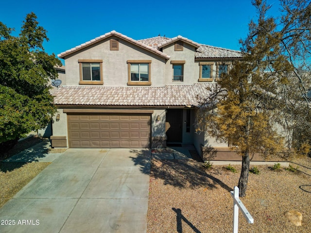 view of front of property with a garage