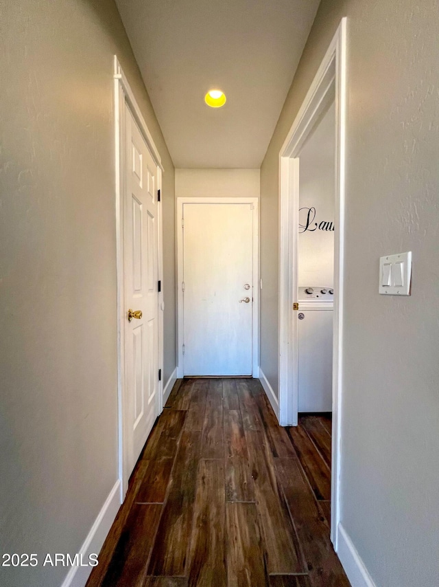 hallway featuring dark hardwood / wood-style flooring