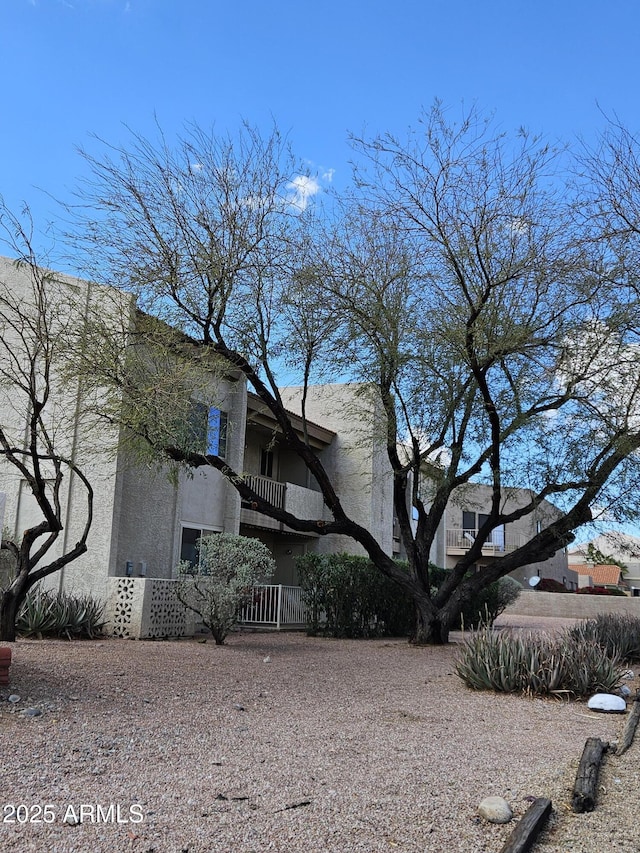 16624 E Palisades Blvd Unit 101, Fountain Hills, AZ 85268 - view of side of home with stucco siding