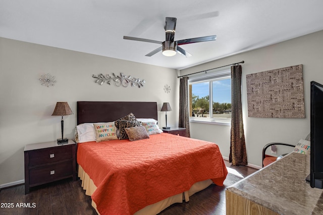 16624 E Palisades Blvd Unit 101, Fountain Hills, AZ 85268 - bedroom with baseboards, dark wood-style flooring, and ceiling fan