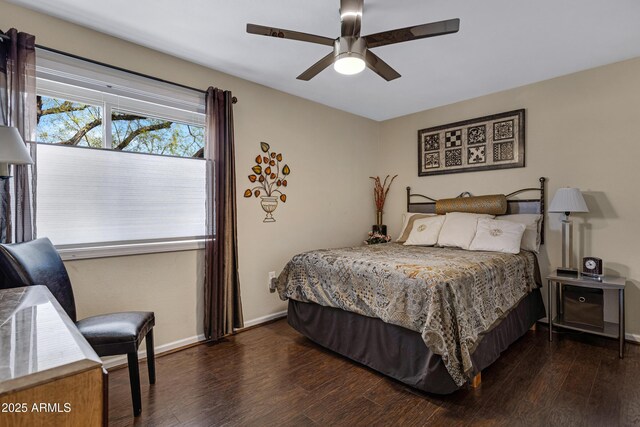16624 E Palisades Blvd Unit 101, Fountain Hills, AZ 85268 - bedroom featuring baseboards, wood finished floors, and ceiling fan