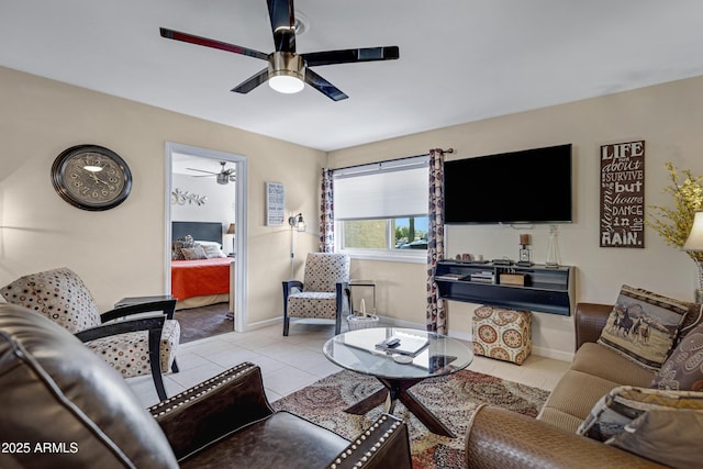 16624 E Palisades Blvd Unit 101, Fountain Hills, AZ 85268 - tiled living room featuring baseboards and a ceiling fan