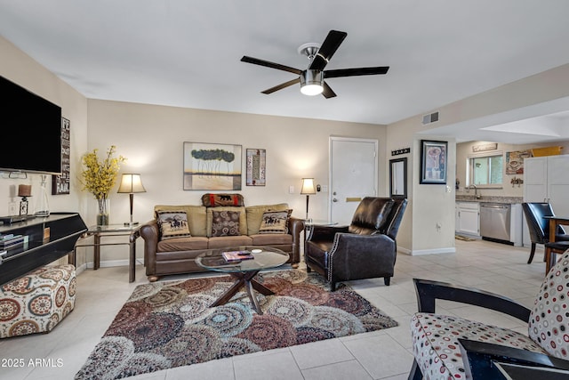 16624 E Palisades Blvd Unit 101, Fountain Hills, AZ 85268 - living area featuring baseboards, visible vents, ceiling fan, and light tile patterned floors