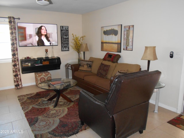 16624 E Palisades Blvd Unit 101, Fountain Hills, AZ 85268 - living room featuring tile patterned floors and baseboards