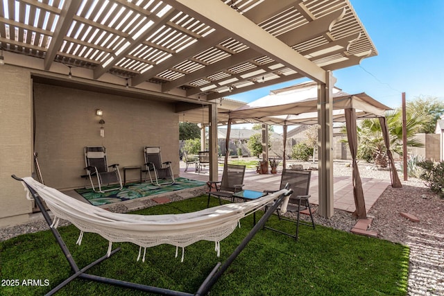 view of patio featuring a pergola