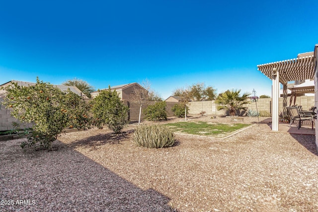 view of yard with a patio area and a pergola