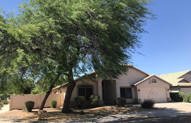 view of front of home with a garage