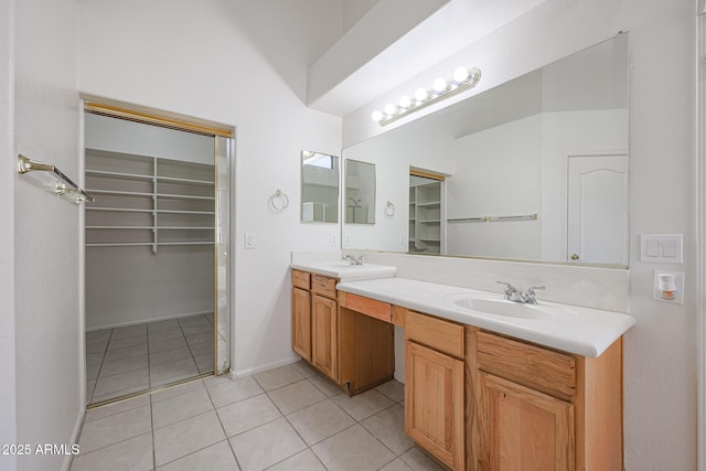 bathroom with vanity and tile patterned flooring