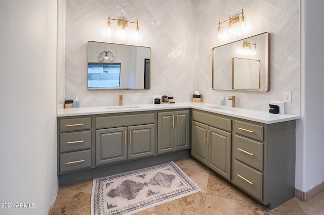 bathroom with tile patterned flooring and vanity