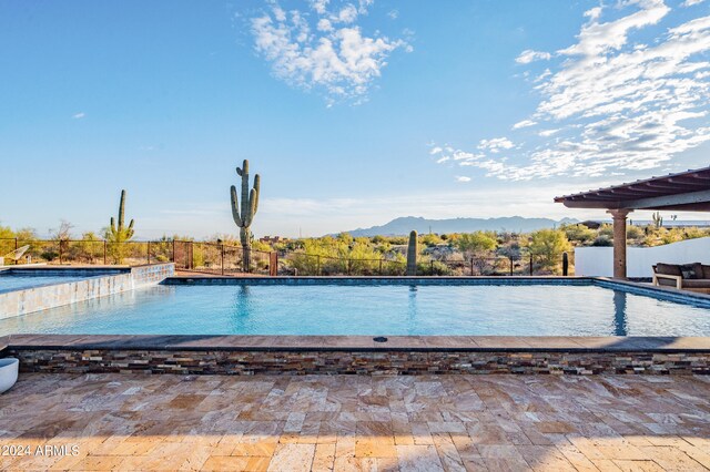 view of pool featuring a mountain view