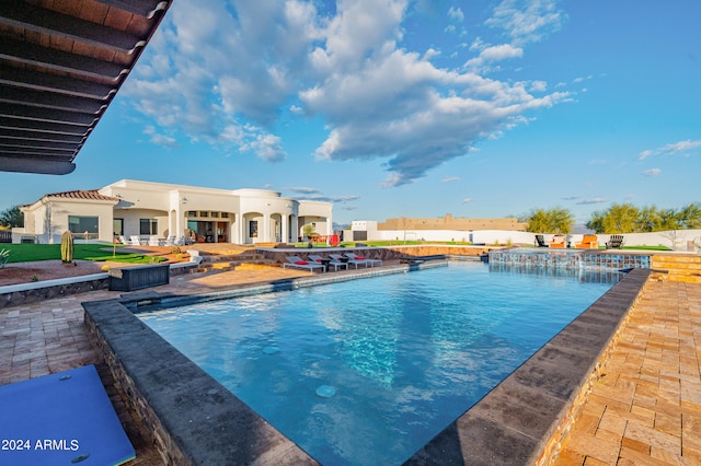 view of pool featuring a patio and pool water feature