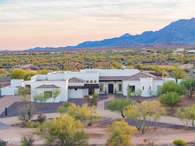 view of front of home featuring a mountain view