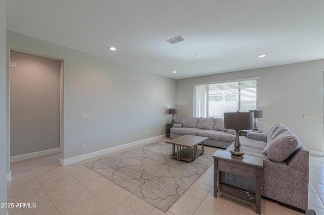 living room with light tile patterned floors