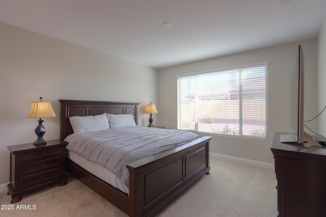 bedroom with light carpet