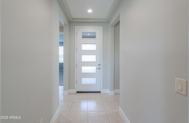 foyer entrance with light tile patterned floors