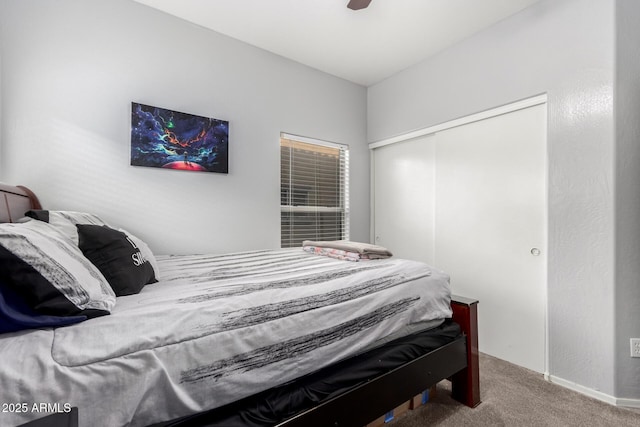 bedroom featuring a closet, ceiling fan, and carpet