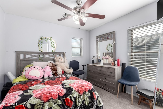 carpeted bedroom with ceiling fan