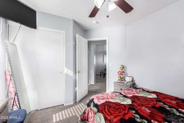 bedroom with light colored carpet and ceiling fan