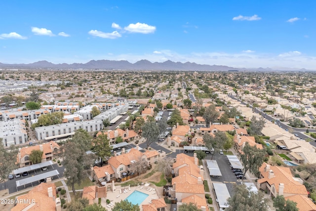 drone / aerial view with a residential view and a mountain view